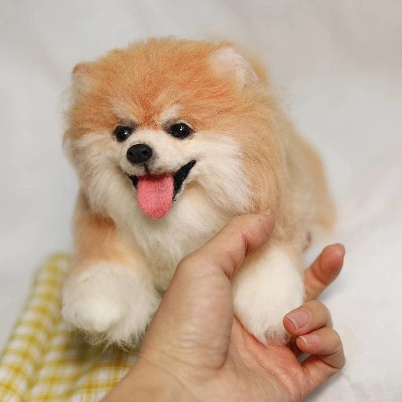 Dog and cat holding open-mouthed smiling felted wool animals