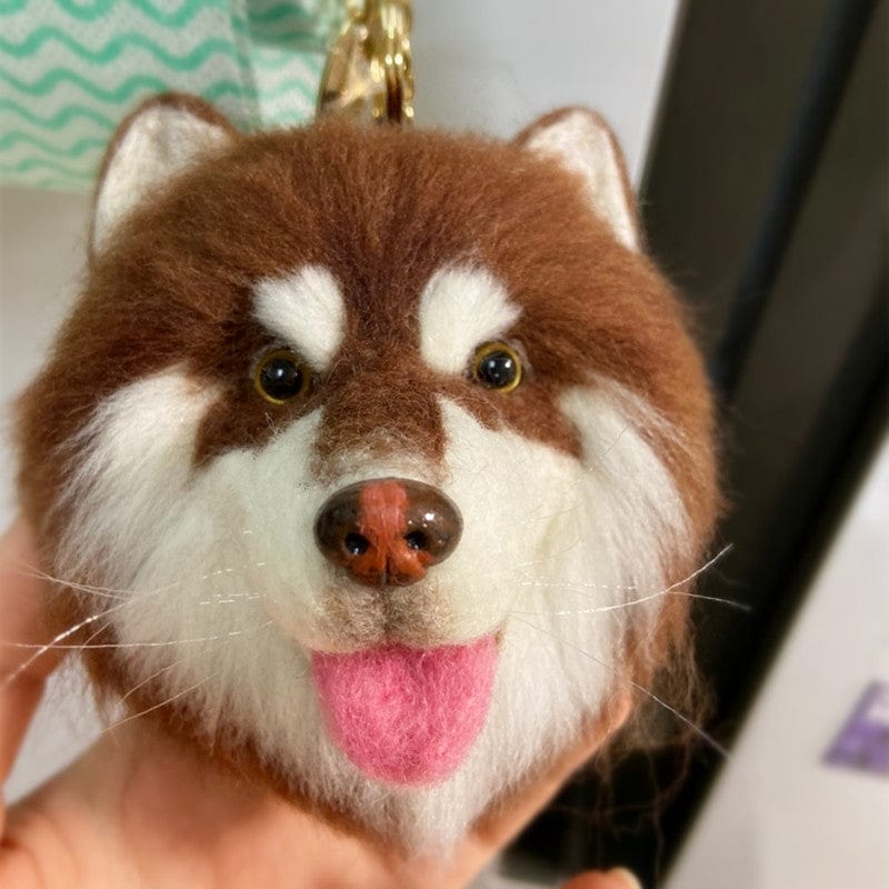 Decorative brown and white dog head pendant