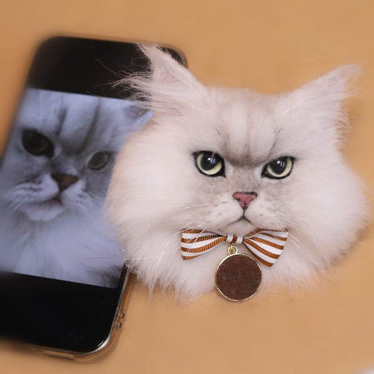 Comparison of wool felt replica cats and pictures